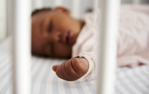 young girl takes nap after using tips for baby insomnia