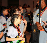 Shaolin Kungfu Chan students compete in martial arts tournaments.