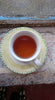 cup of darjeeling on window sill