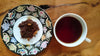 Blood orange rooibos drink and steeped leaves