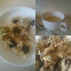 Cup of chrysanthemum tea and flowers
