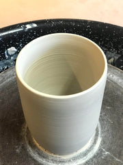 Freshly made pottery cup