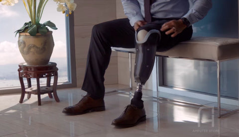 Dwayne Johnson putting on his prosthetic leg.