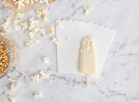creamsicles topped with popcorn