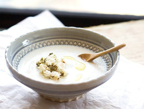 soup topped with popcorn