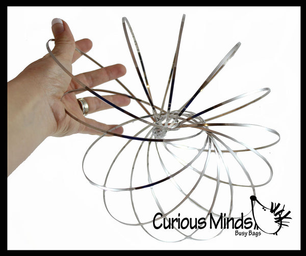 Nouveau jouet Spring Flow Anneaux Extérieur Jeu Intelligent Flux Ring Infinity Arm Slinky 