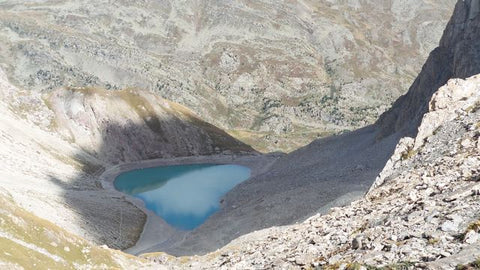 high-lake-mountain-french-alps-green-water