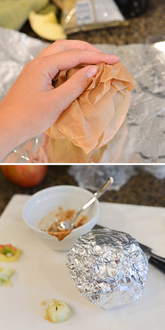 Wrap parchment paper around apple and secure with foil