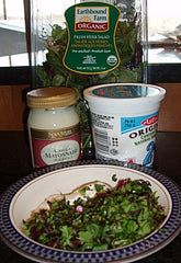 To prepare dressing, combine arugula and mayonnaise; set aside.