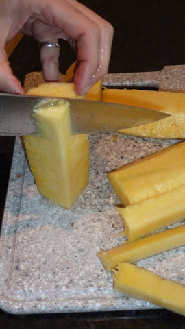Cutting Off Woody, Inner Edges of the Pineapple
