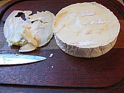 Cut the top rind off of the Brie
