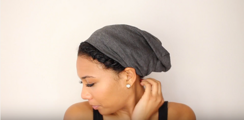 Step 8: Don’t let your twist-outs hold you back, put on a Satin-Lined Cap so that you can discreetly protect your style while you’re shopping for tonight’s outfit!