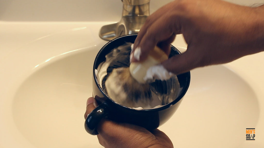 Continue building the later in a shaving bowl or mug.