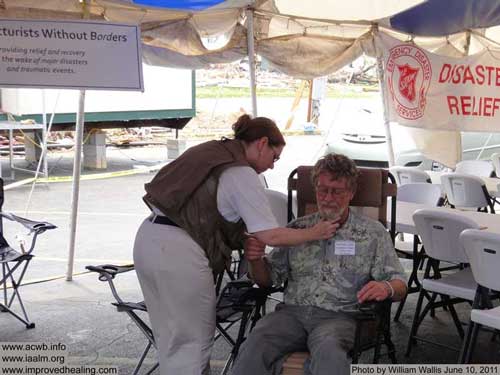 Mary works with volunteer Ron Vickery