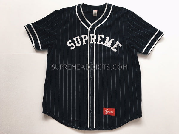 black baseball jersey with white pinstripes