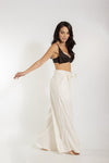 Pantalon largo ivory pretina ancha cinturon bolsillos tela fresca playa calle