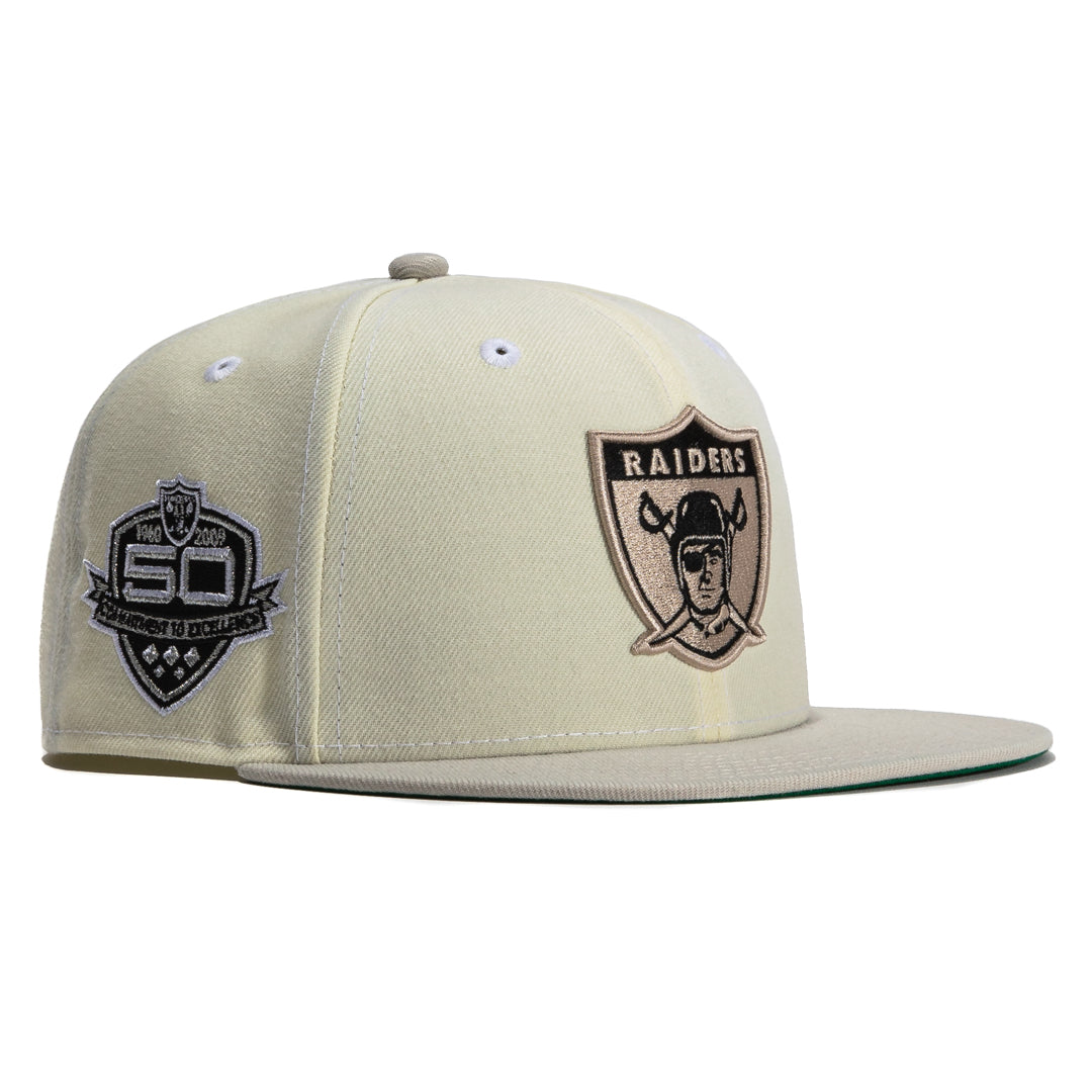 beige raiders hat