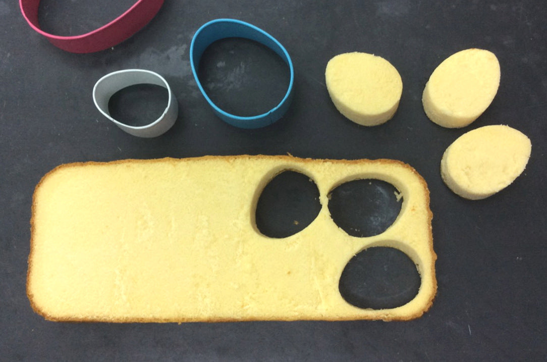 Cutting Pound Cake with Egg Shaped Cookie Cutters for Mini Easter Egg Cakes