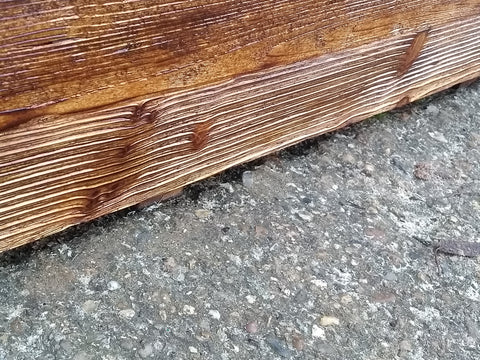 Scorched wooden planter grooves 