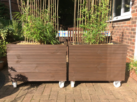 Decking wooden planters on wheels