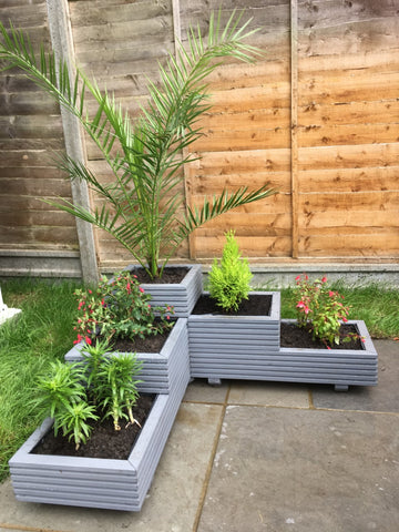 Corner planter made of decking