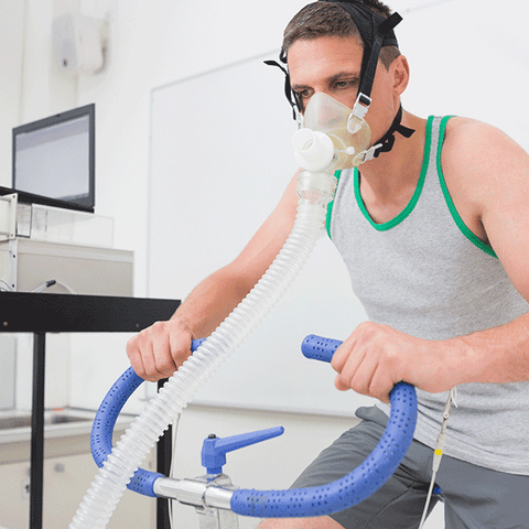 Man Using Respirator While Exercising