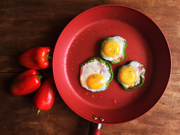 eggs fried with tomato in bell pepper