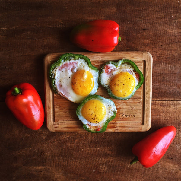 eggs fried with tomato in bell pepper