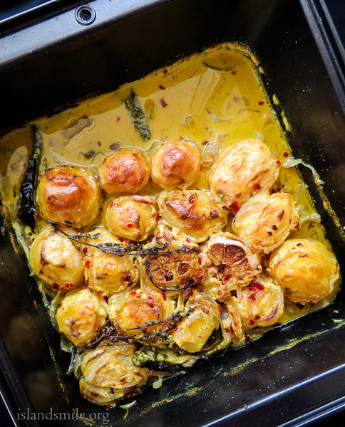 Turmeric Infused Baked Potatoes with Garlic by Island Smile