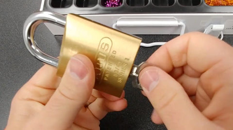 Insert key and turn ABUS 83 Padlock