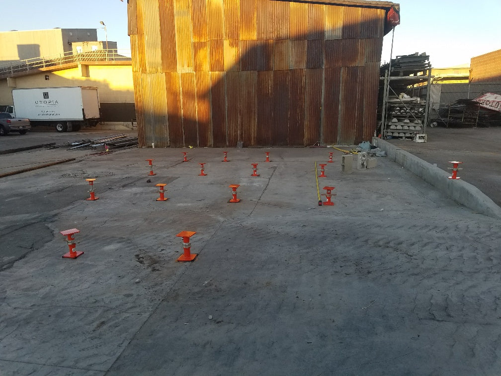 20 Ellis Light Duty Steel Shores placed on concrete for adjustable foundation