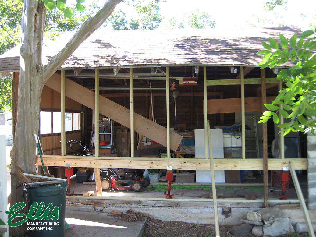 Supporting and Jacking Roof While Wall is being reconstructed.