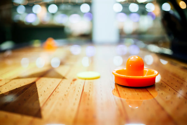 A close up picture of a popular air hockey table surface