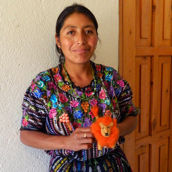 Mayan Hands artisan with needle felted animal
