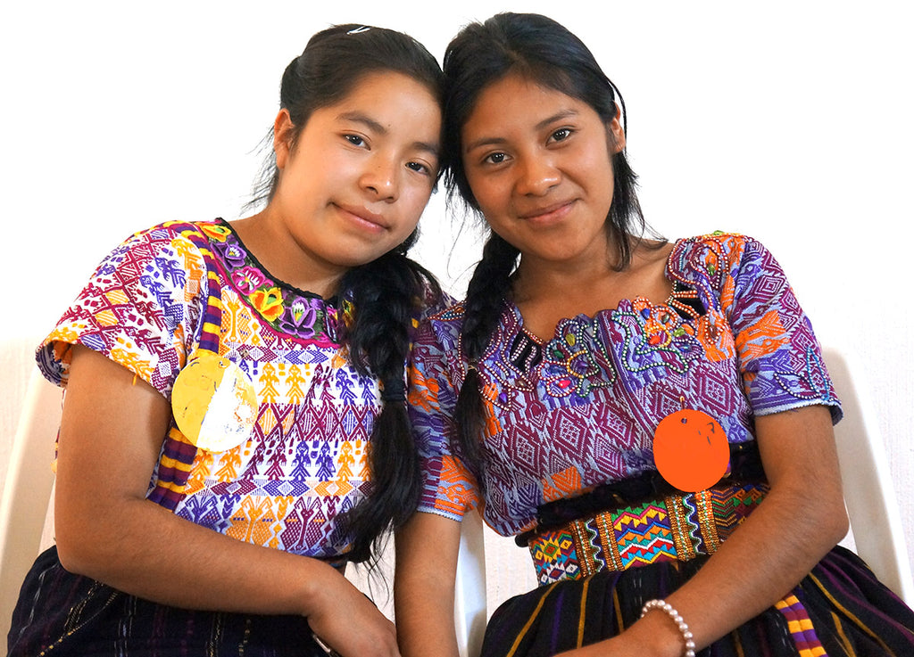 two Mayan Hands scholarship recipients