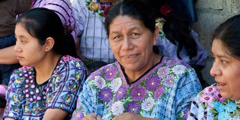 Santiago Atiplan weavers wearing huipiles