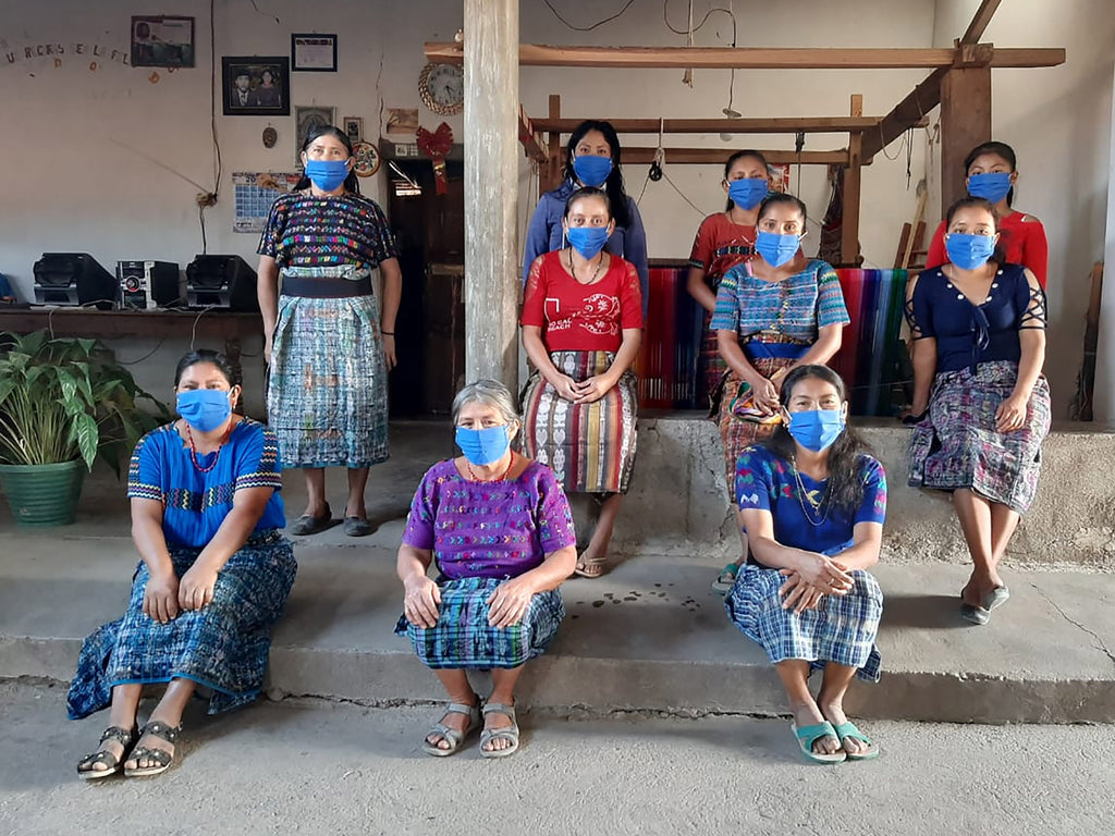 Mayan Hands weavers wearing masks