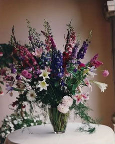 A large bouquet including lilies, foxgloves, and zinnias - Renee's Garden