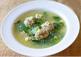 Escarole soup with meatballs in a white bowl - Renee's Garden