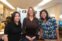 Three volunteers with the Great Sunflower Project - Renee's Garden