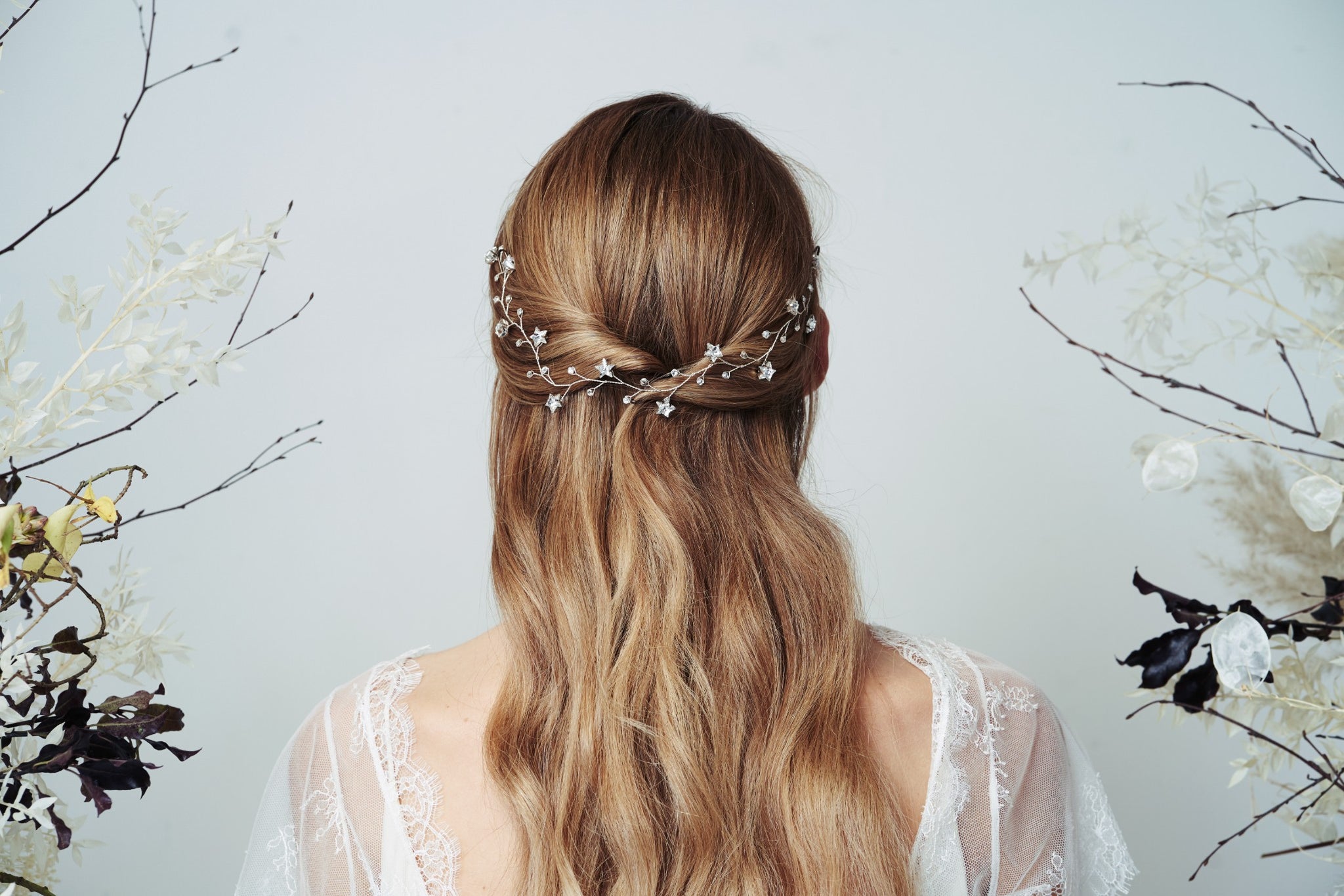 Silver star celestial hairvine pinned in the back of a half up hairstyle