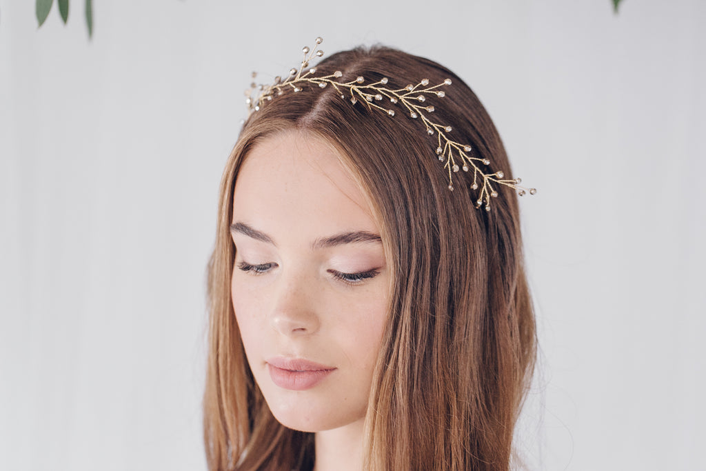 Rosemary gold ribbon tie headband worn as a crown