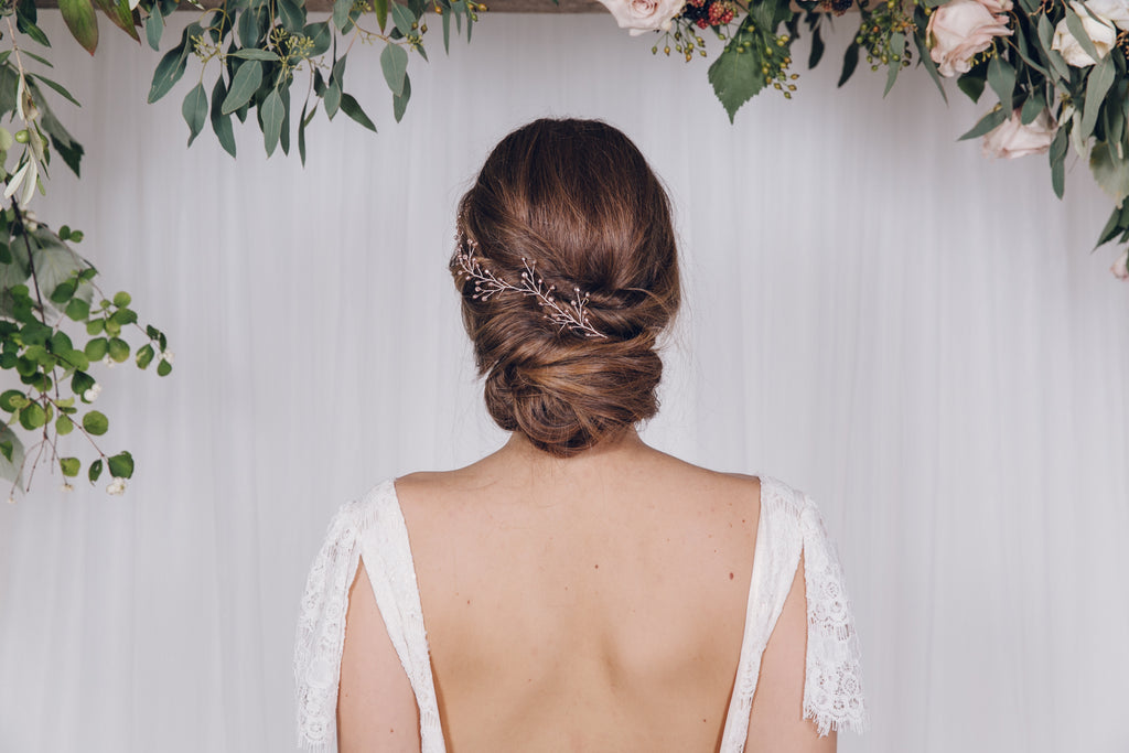 Rosemary rose gold ribbon tie bridal headband worn as a hair vine