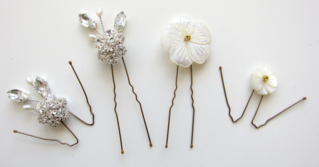 Wedding hair pins bent into hooks to make them stay in place