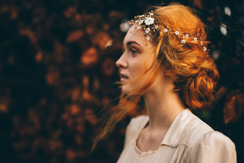 Loose braided bridal up do hair with gold flower hair vine by Debbie Carlisle