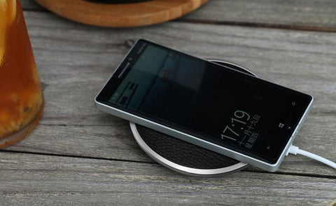 Wireless phone charging pad