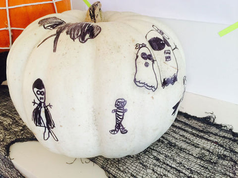 Designing Pumpkins with Black Sharpie