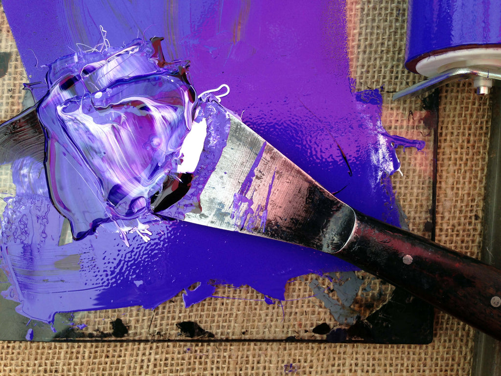 Mixing purple ink.