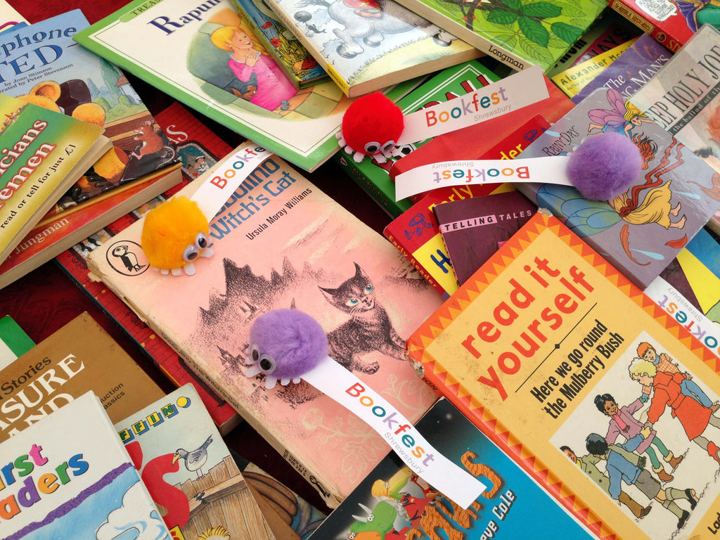 Heaps of children's books to swap or buy on the Bookfest tables.