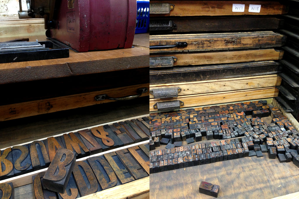 Cabinets full of wood & metal type.